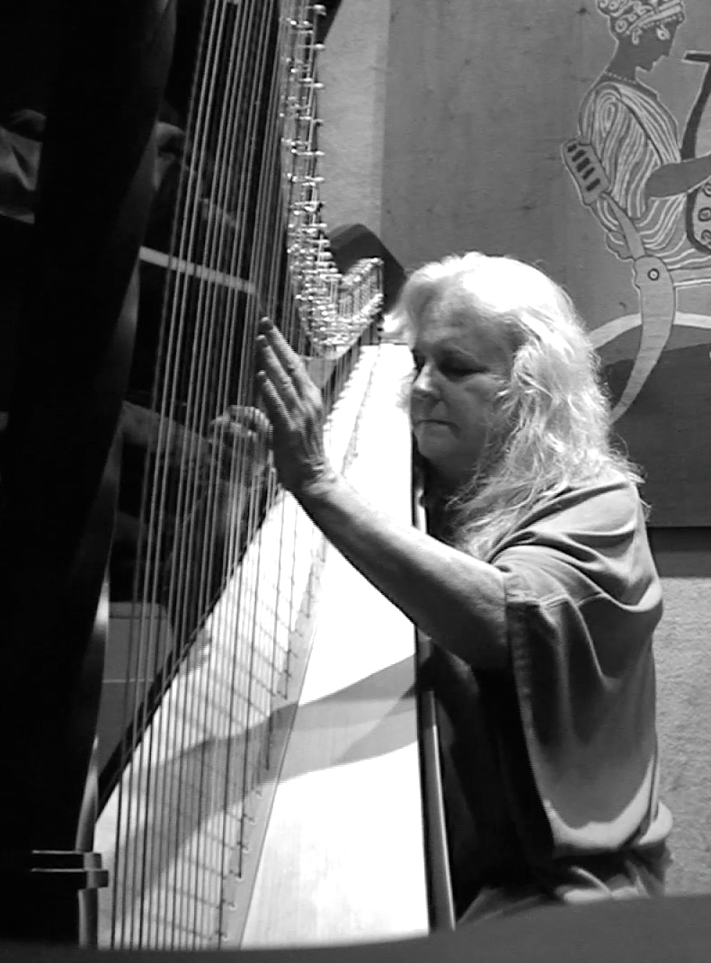 Susan Allen playing harp